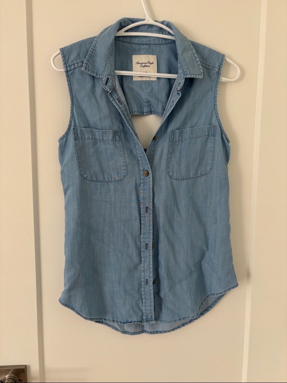 American Eagle Outfitters Light Wash Sleeveless Chambray Button-Down